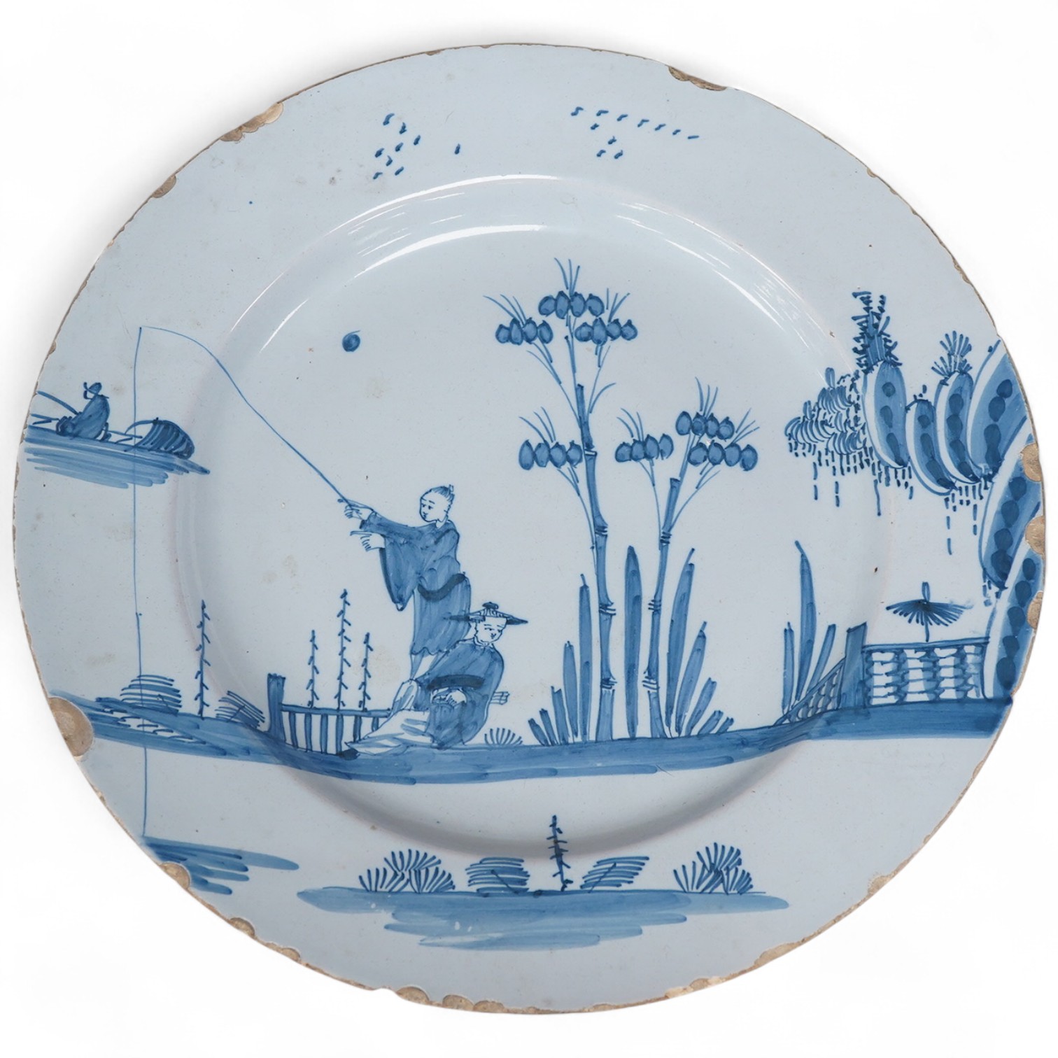 An 18th century English delftware plate, 34cm
